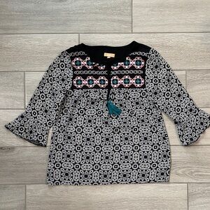 Takara Black and White Patterned Blouse with Teal Accents